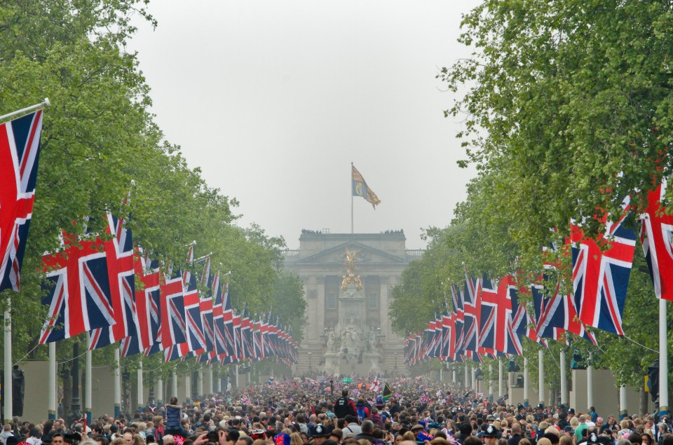 Right on queue . . . thousands of well-wishers line The Mall to cheer