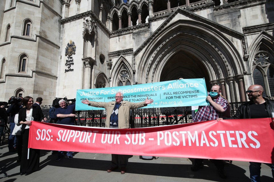 Noel Thomas celebrates outside the Royal Courts of Justice, London