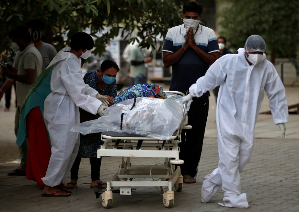 A family prays for a Covid victim in Ahmedabad