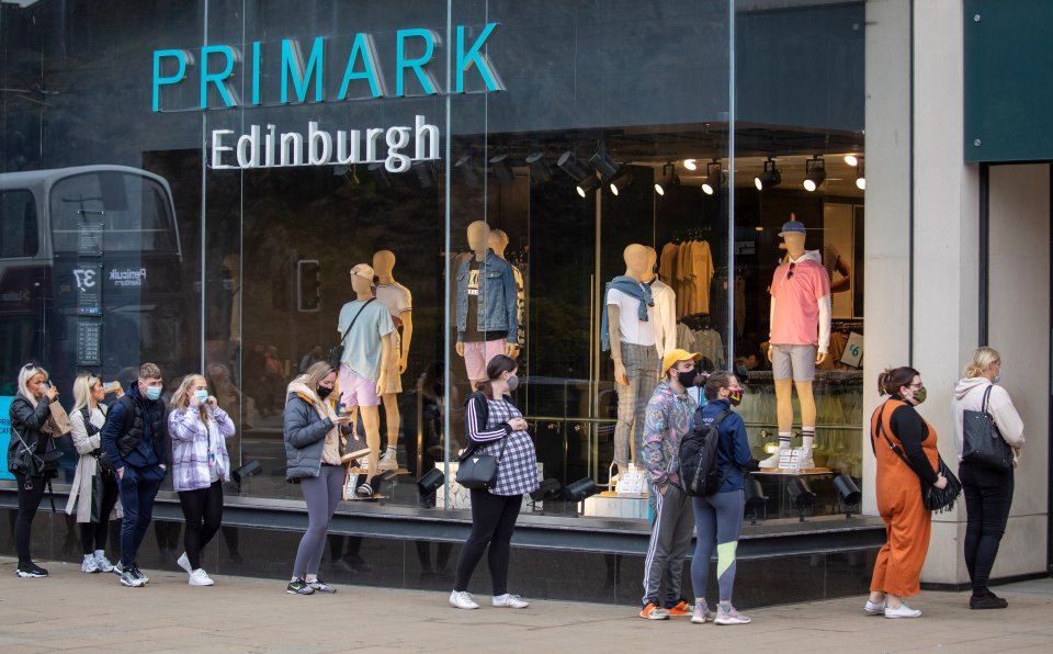 A queue of eager shoppers waited to get into Primark in Edinburgh this morning