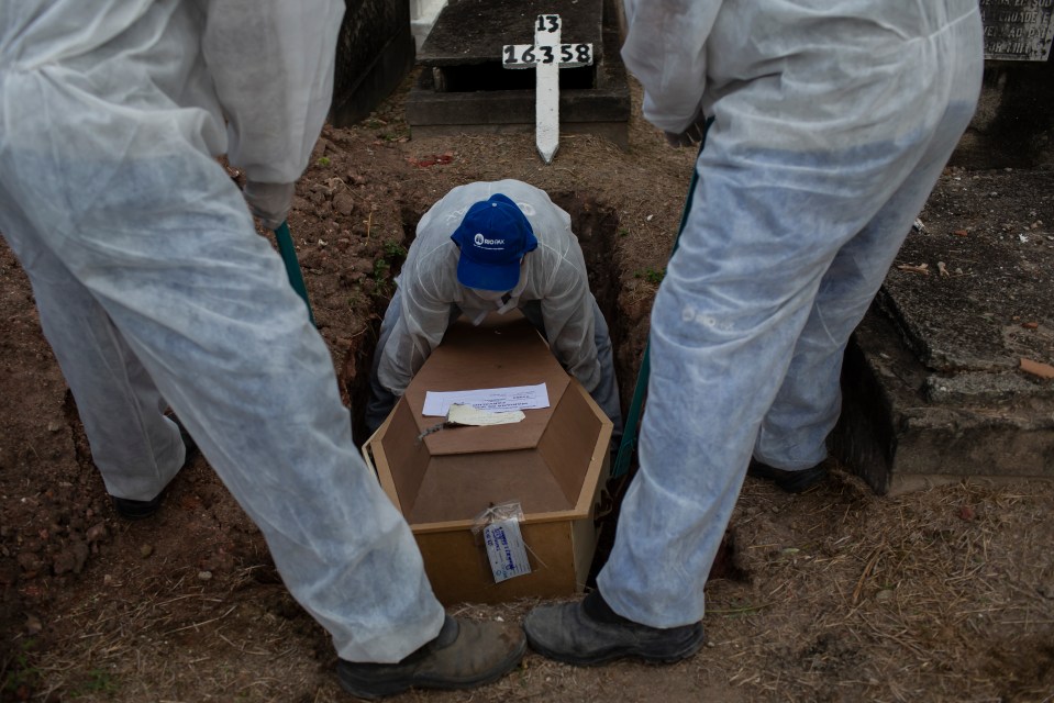 The Brazil variant could spread twice as fast as older strains and could also be twice as lethal. Pictured: The body of a Covid victim is buried at the Inahuma cemetery in Rio de Janeiro, Brazil, April 28