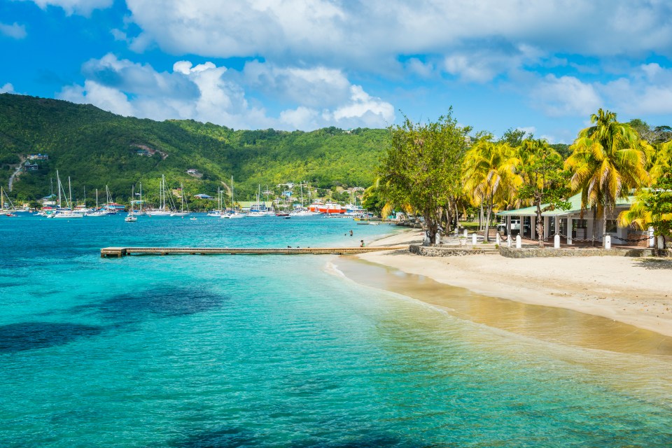 Blue seas and white beaches in Bequia, in St Vincent and the Grenadines