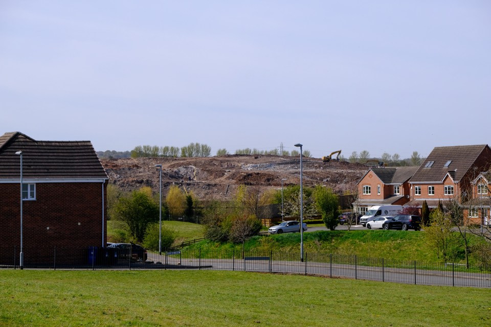 Houses look on to the dump, with residents complaining of the smell