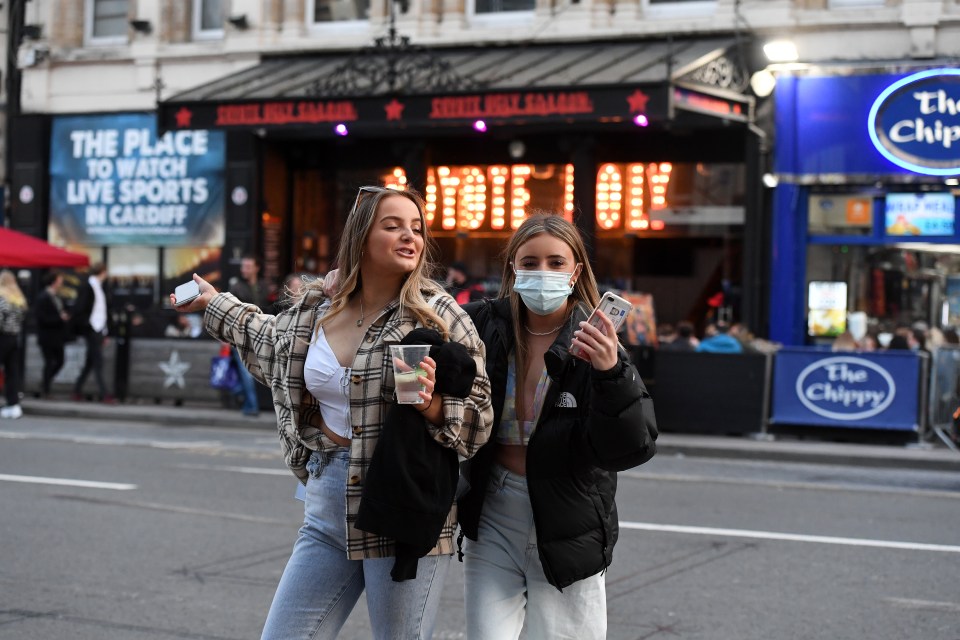 Many pubs, bars and restaurants had put up umbrellas and tents to protect their patrons from the drizzle