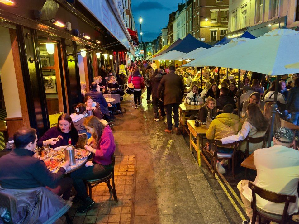 People enjoying a Friday evening in London's Soho