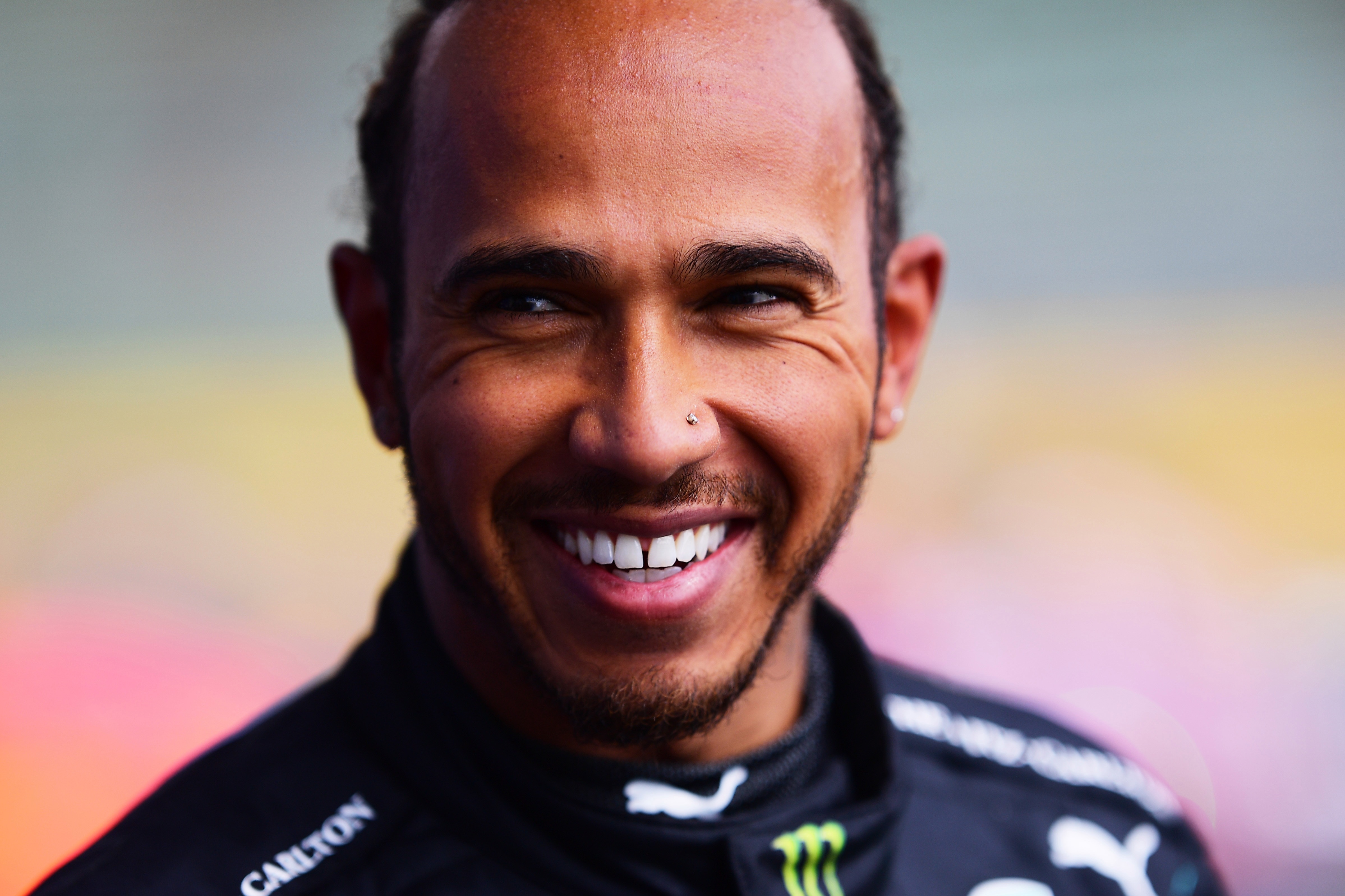 Lewis Hamilton was all smiles after grabbing yet another pole position