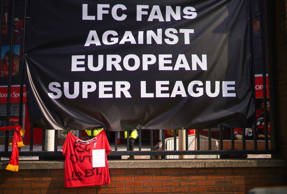 Banners and scarves were tied to the fences around Liverpool’s Anfield Stadium in protest against the European Super League