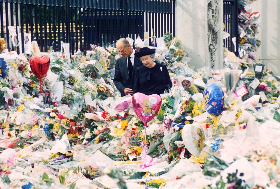 The Queen and Prince Philip inspecting floral tributes after Diana’s death in 1997