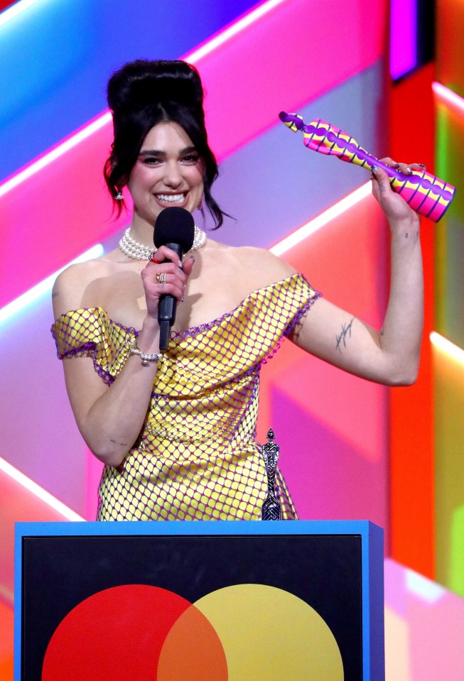 Dua Lipa divides fans with NHS pay speech - after travelling the world and partying throughout the pandemic