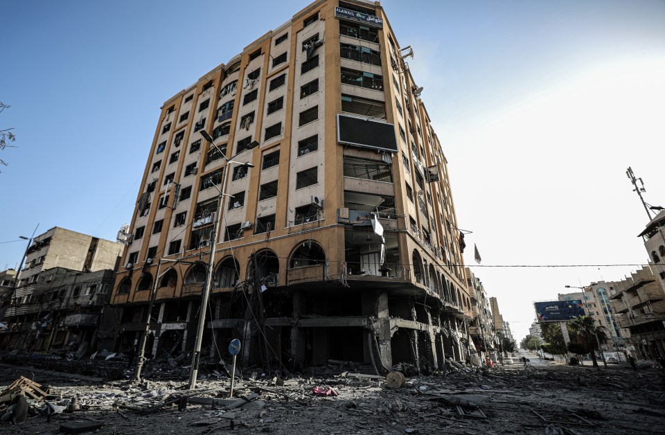 A view of damaged nine-storey Al Jawhara Tower after it was hit by Israeli warplanes