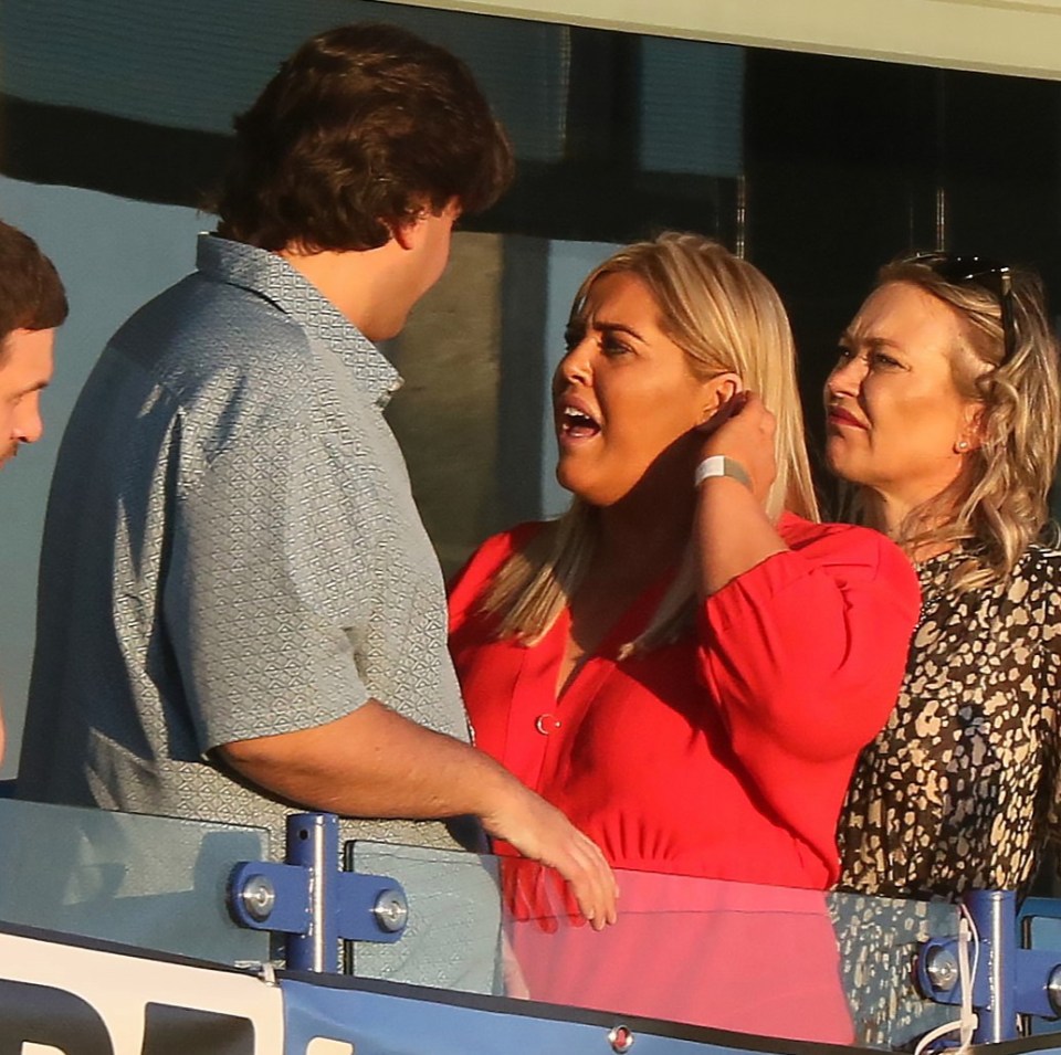 They looked deep in conversation as they watched the match