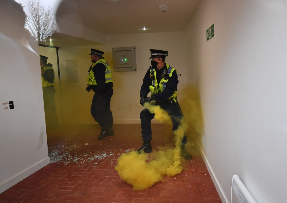 Police had to deal with flares inside the stadium as fans got in