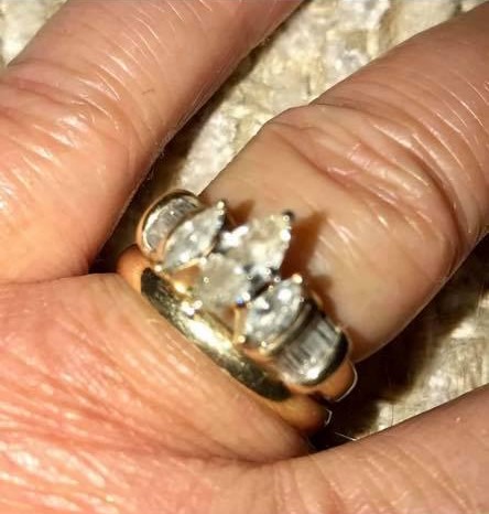 The woman's husband found the ring in their garden which she claims costs $8k (£5.7k)