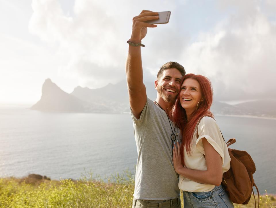 Brits are being warned not to share their holiday snaps when they go abroad