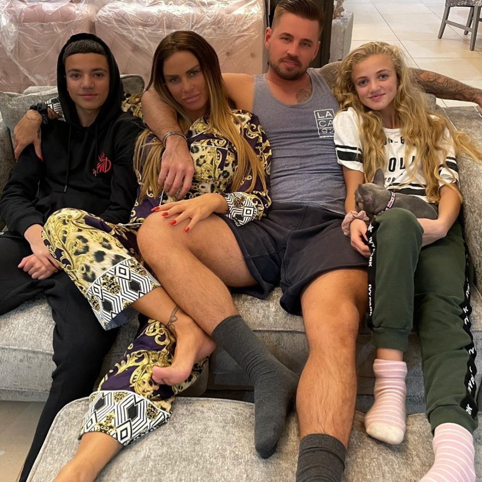 The star cosied up at home with son Junior, fiance Carl and daughter Princess