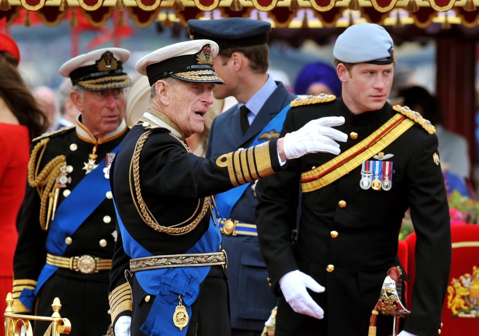 Prince Harry with his father Prince Charles and his late dad Prince Philip