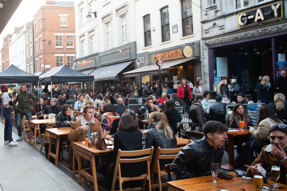 Cases have risen across the UK in the past week, ZOE says. Pictured: Outside dining in London, April 13