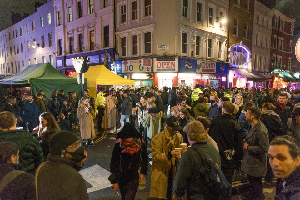 Customers rushed to return to bars and pubs in Soho, London when restrictions eased on April 12