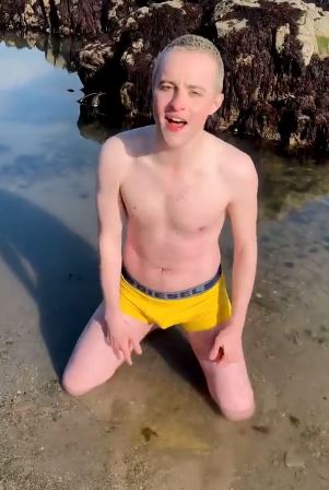 Edward also stripped down for a dip in the water