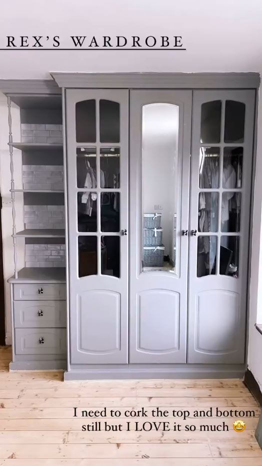 The grey cupboard now matches the rest of the room