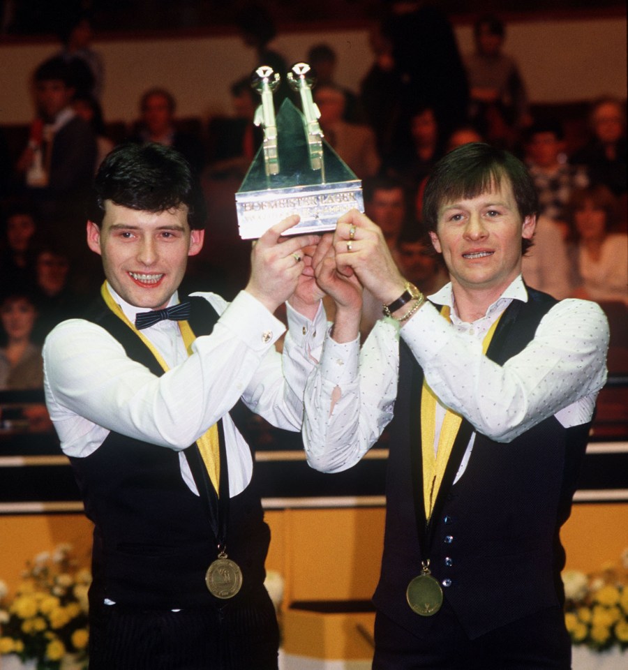 Alex Higgins and Jimmy White hold the trophy at the 1984 Hofmeister World Doubles Championship