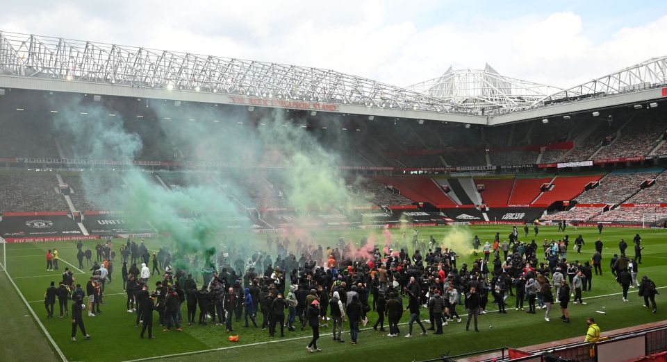 Hundreds of Manchester United fans stormed the Old Trafford pitch