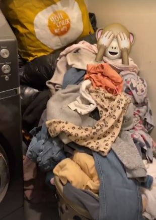 A huge washing pile is common for Sue who still has 17 kids living at home