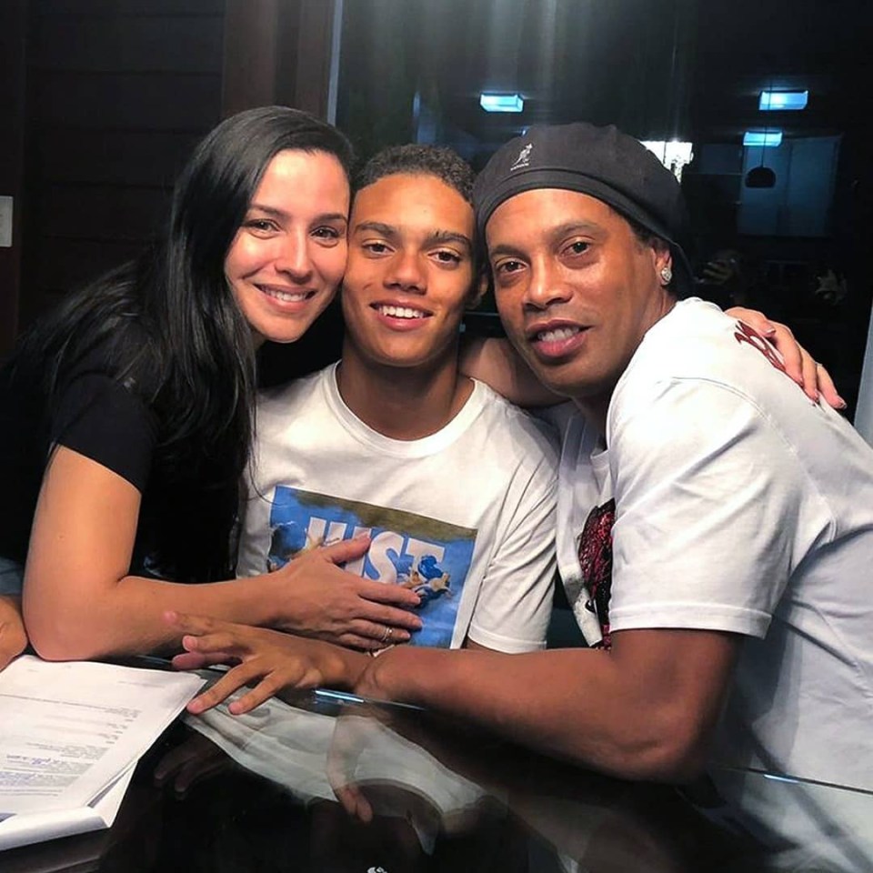 Ronaldinho and Janaina Mendes with their footballer son Joao who signed for Nike