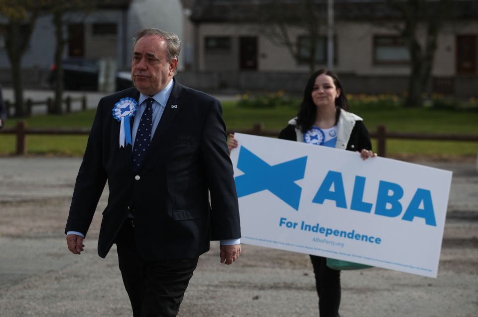 Alex Salmond arrives to cast his vote during big elections in Scotland today