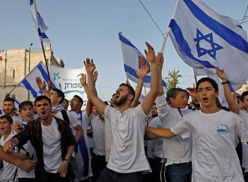 Israelis take part in the annual Jewish nationalist Jerusalem Day march