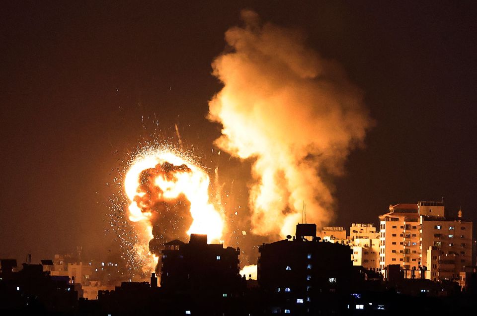 Fire billows from Israeli air strikes in the Gaza Strip fired in retaliation for an earlier rocket attack