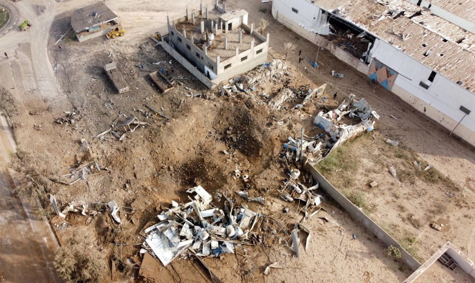 A picture taken with a drone shows the site of an Israeli air strike amid a flare-up of Israeli-Palestinian violence,