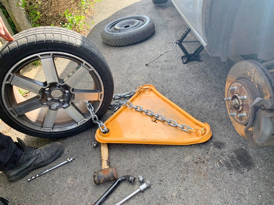 The clamp had not been put on properly so he removed the entire wheel.