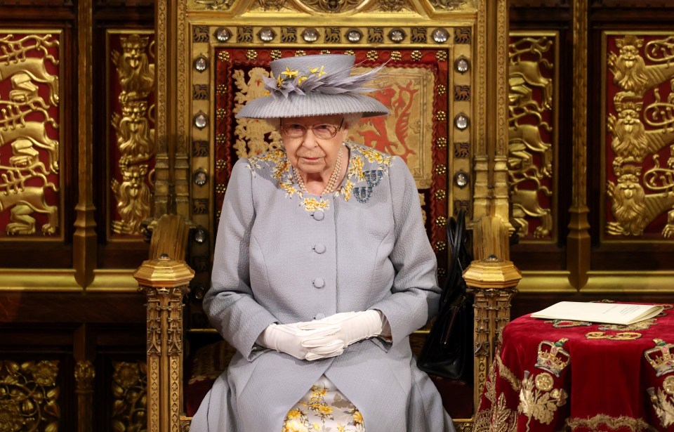 Her Majesty wears a lilac outfit with matching hat to her 67th Parliament opening