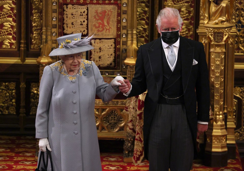 The Queen today with Charles at the state opening of Parliament