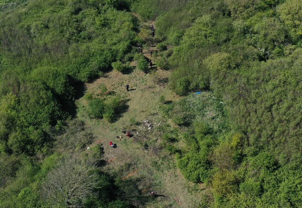 Police search teams and officers from Kent Police Specialist Operational move their search to a large area of woodland on Ratling Road in Aylesham