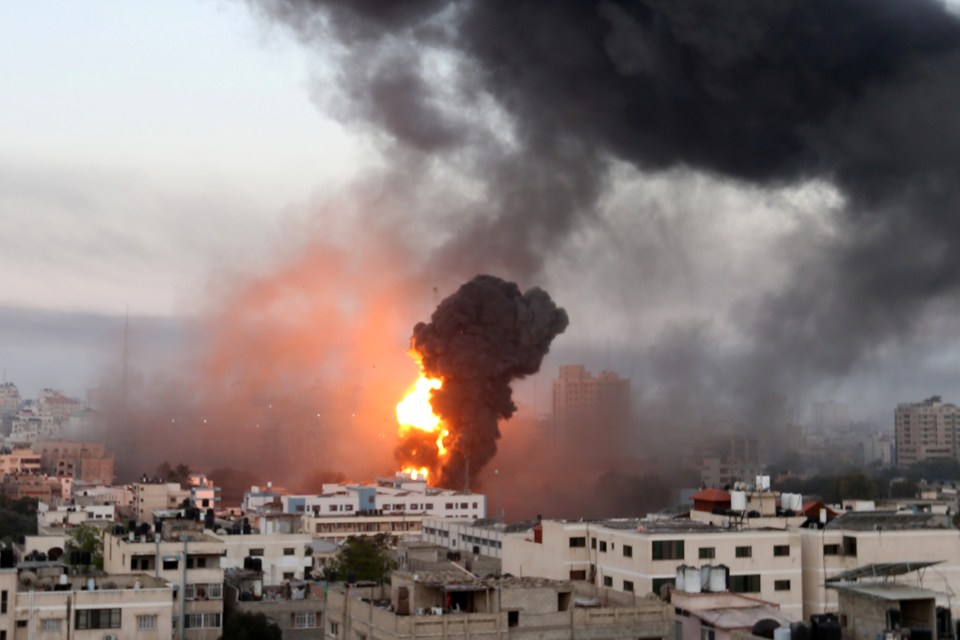 Smoke and flames rise during Israeli air strikes in Gaza