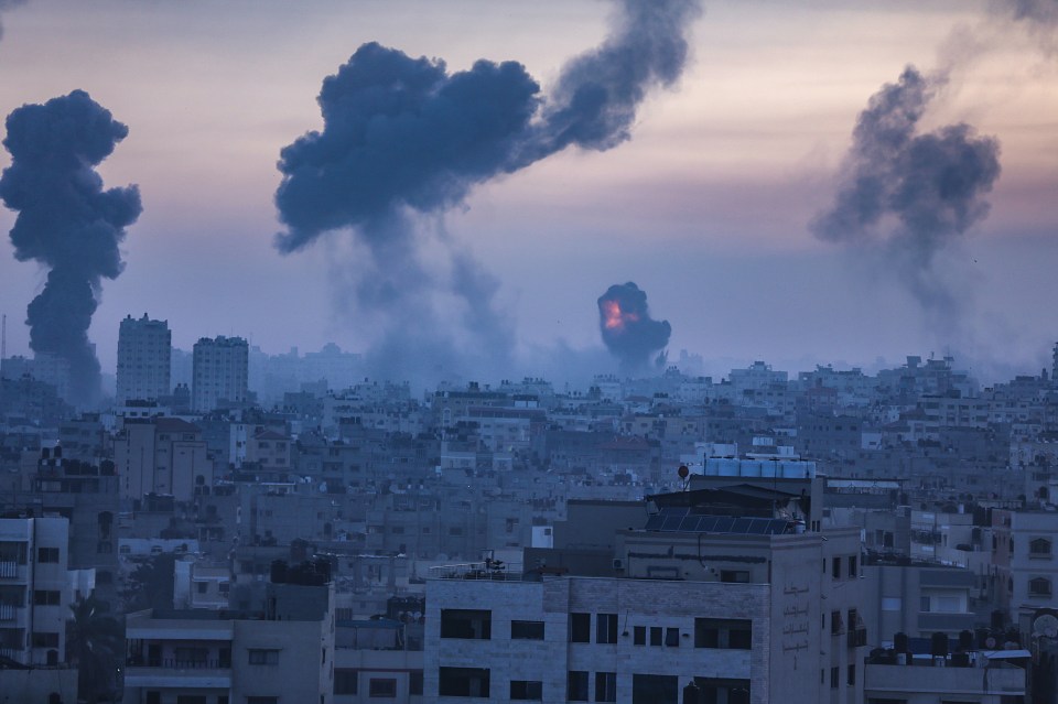 A wall of dark grey smoke rose over Gaza City on Wednesday morning