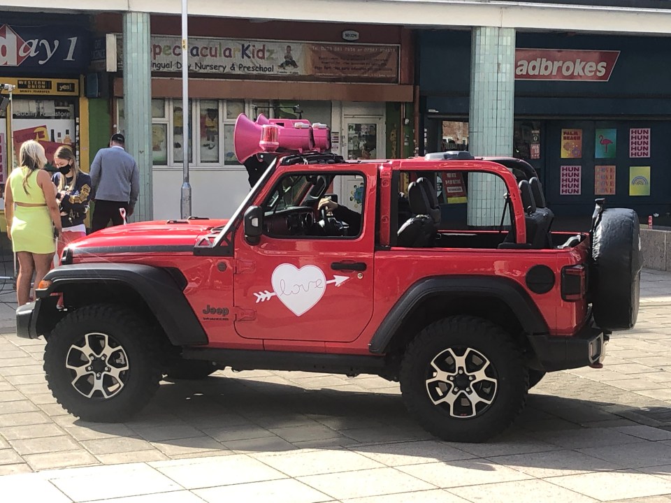 The TV host was spotted driving around in a red dune buggy in Barking, with her narrator husband Iain Stirling, 33