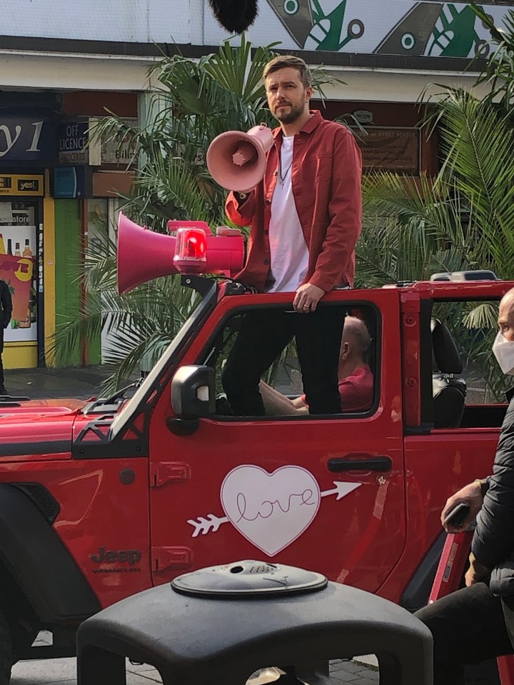 The crew decorated the car with flashing lights and megaphone