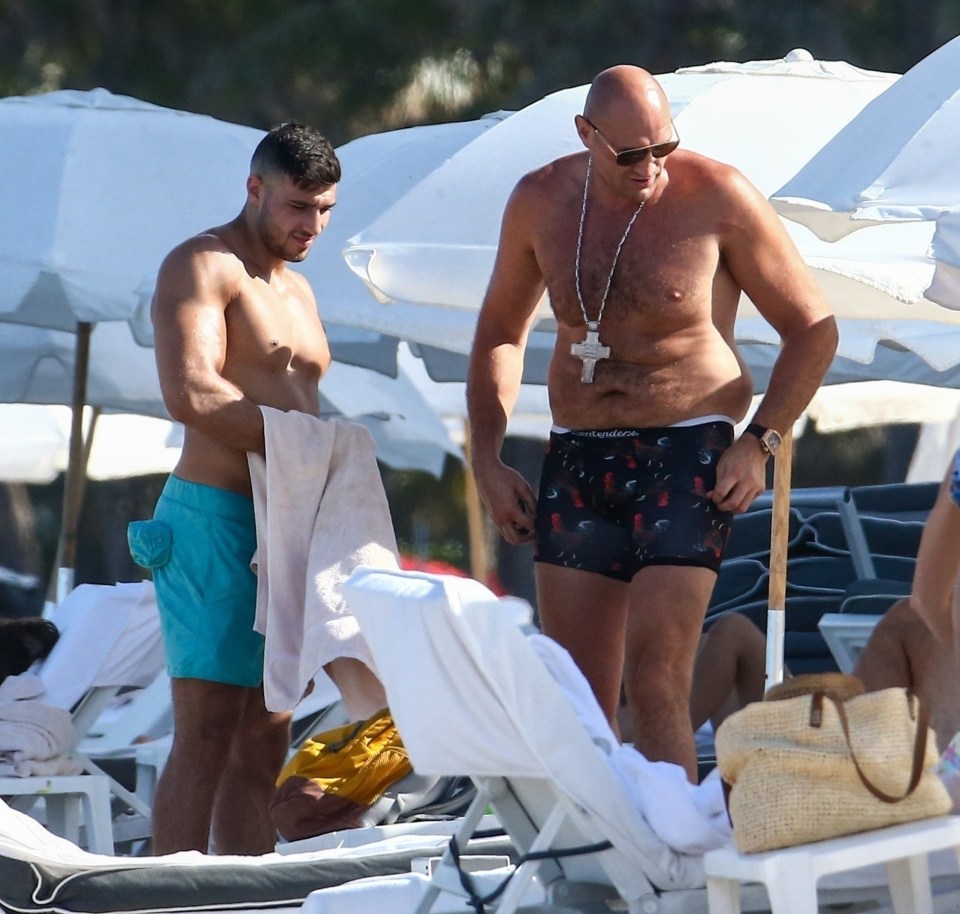 The men concentrated on topping up their tans