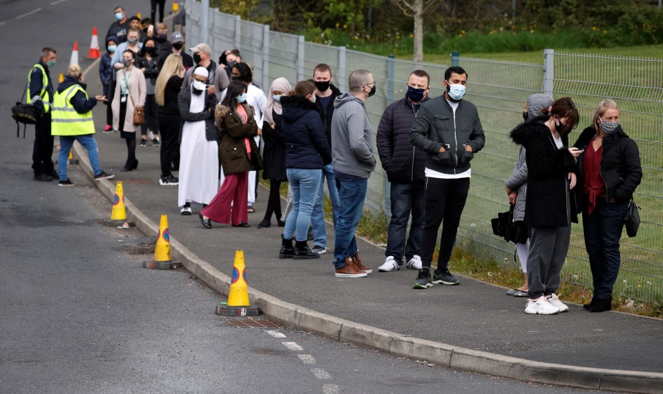 A queue formed at a mobile vaccination centre in Bolton, which has the second highest Covid infestion rate in the UK