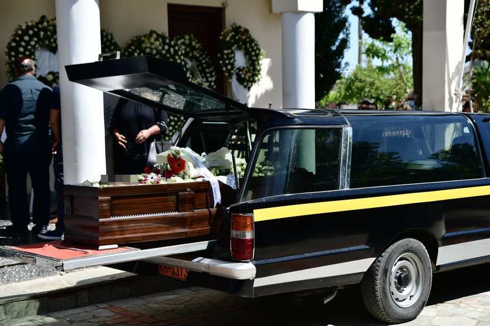 The coffin of Caroline Crouch is carried into the Agia Paraskevi church for her funeral on May 14