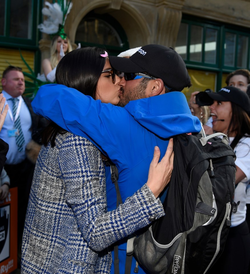 He gave Lucy a kiss on the lips on his arrival