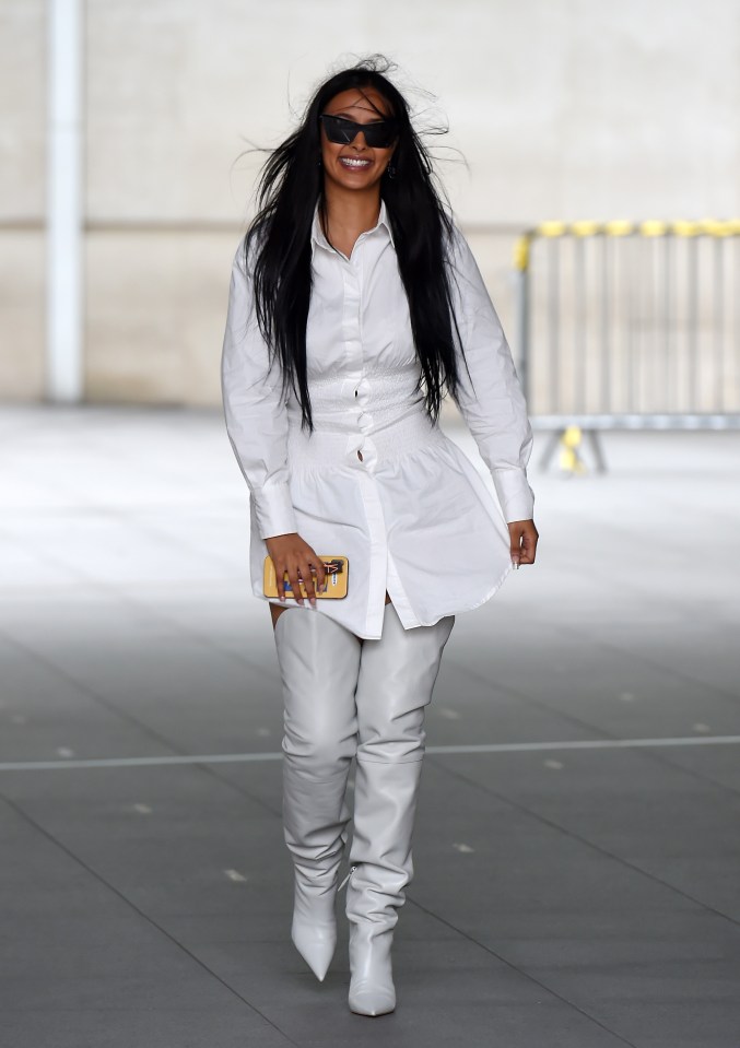 The presenter looked gorgeous in her all white ensemble