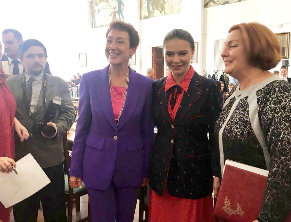 Alina Kabaeva, centre (red dress) was born in 1983 in Uzbekistan, then part of the Soviet Union, and grew up in a sporting family