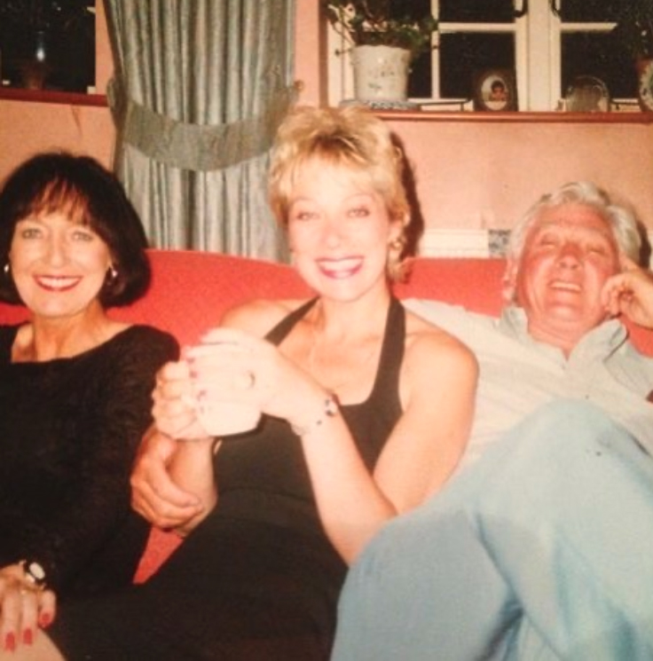 Denise shared a throwback picture of her with her parents on her 63rd birthday