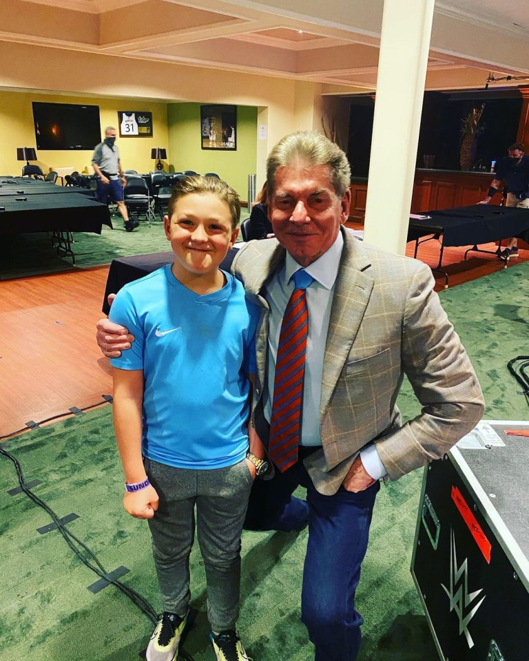 Prince John James poses with WWE chief Vince McMahon