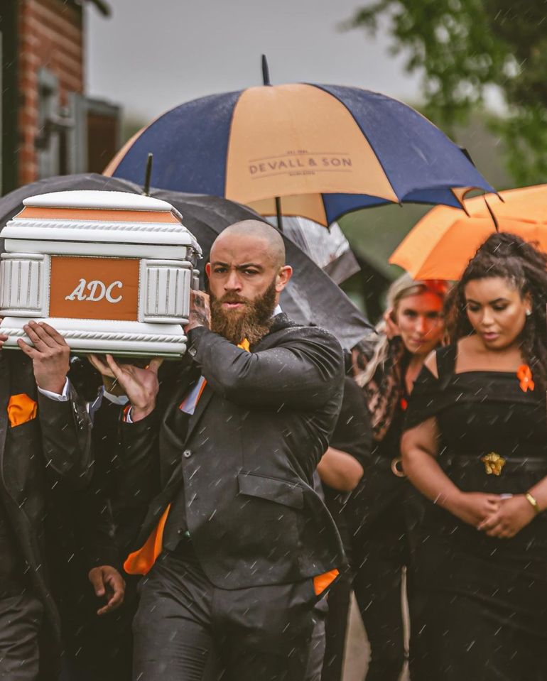 Ashley shared a picture as he carried his daughter's coffin