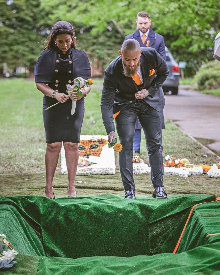 Ashley Cain and Safiyya stand at their daughter's graveside